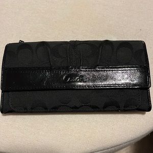 Coach trifold wallet.